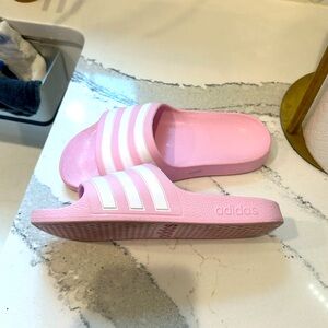 Kids (girls) adidas slides size 3 never worn.